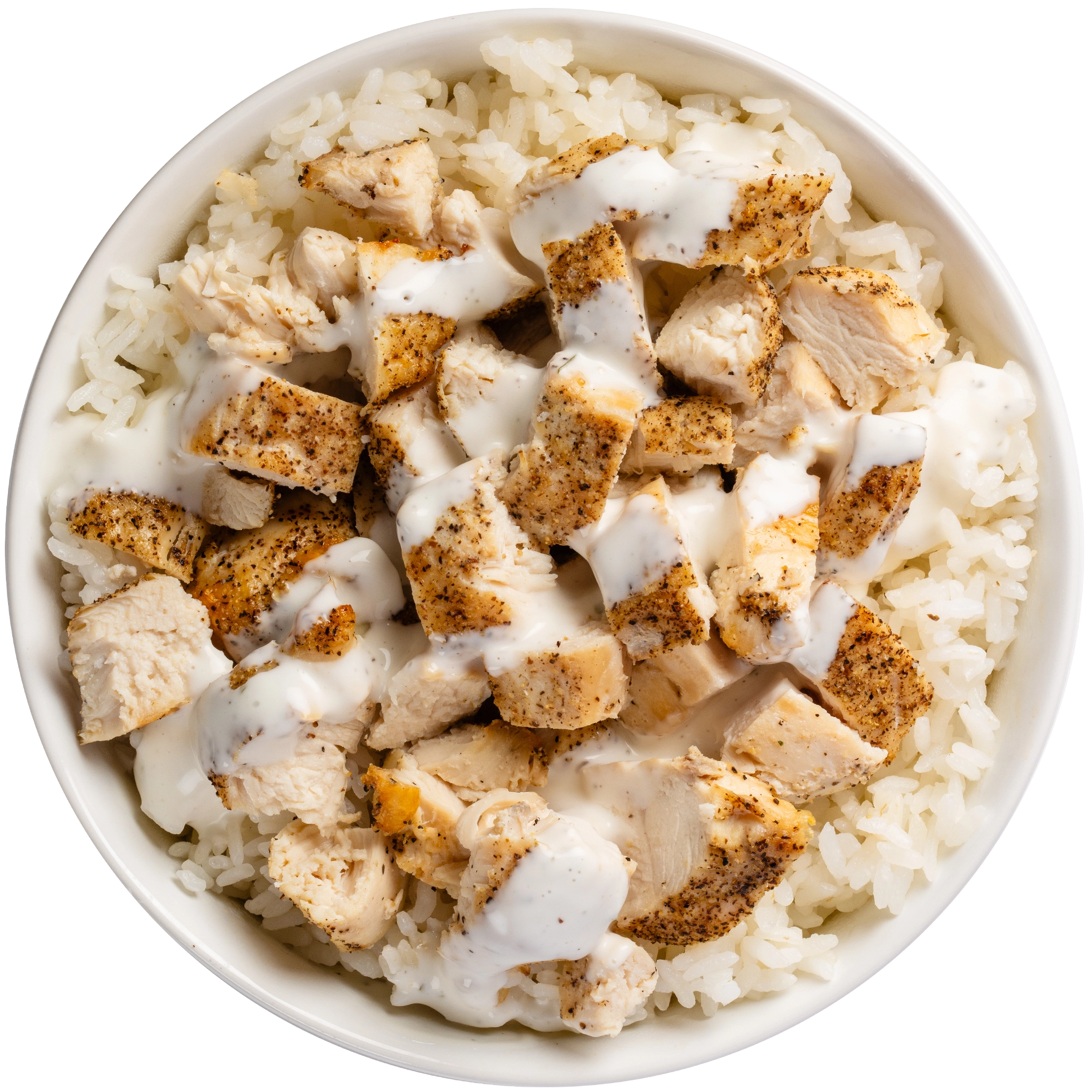 high-protein white rice bowl with pieces of seasoned chicken breast drizzled with ranch